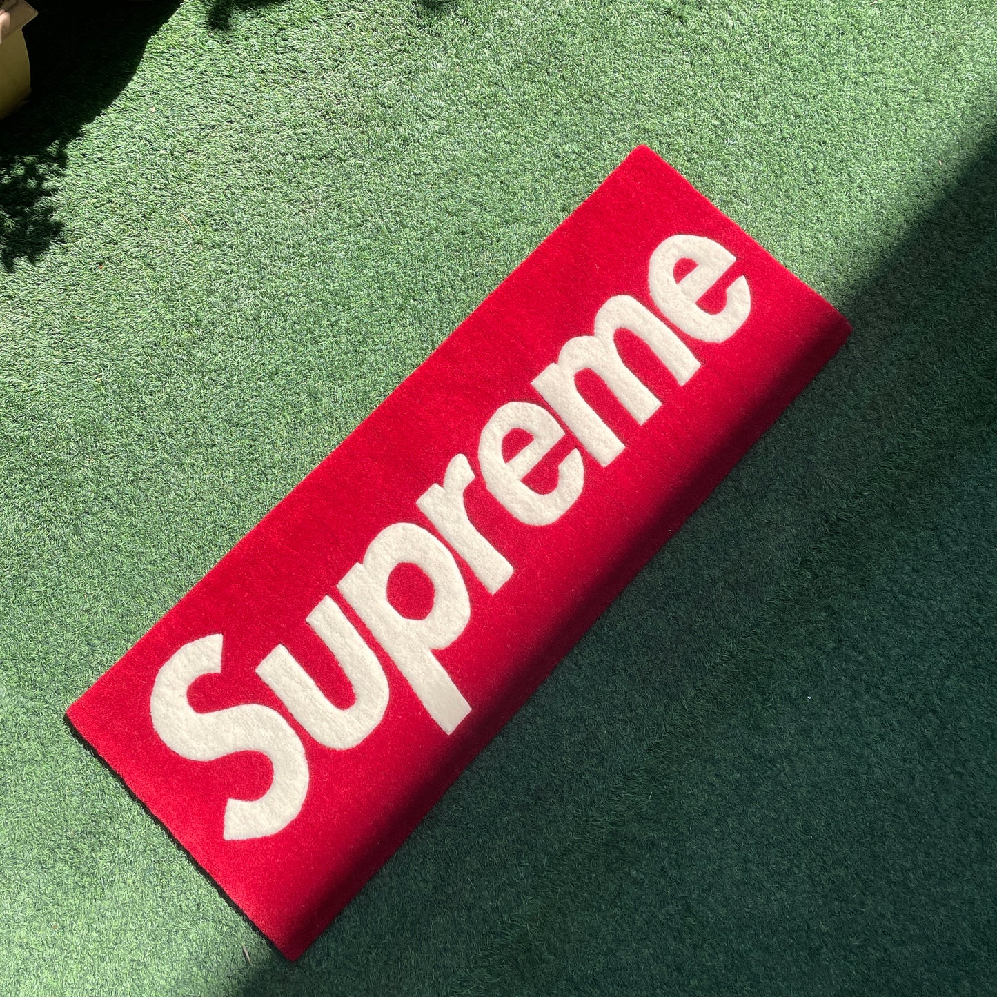 SUPREME RUG